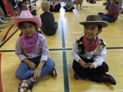 photo of students in cowboy outfits